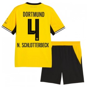 Camisola Borussia Dortmund N. Schlotterbeck 4 Criança 1º Equipamento 2026-27 Manga Curta